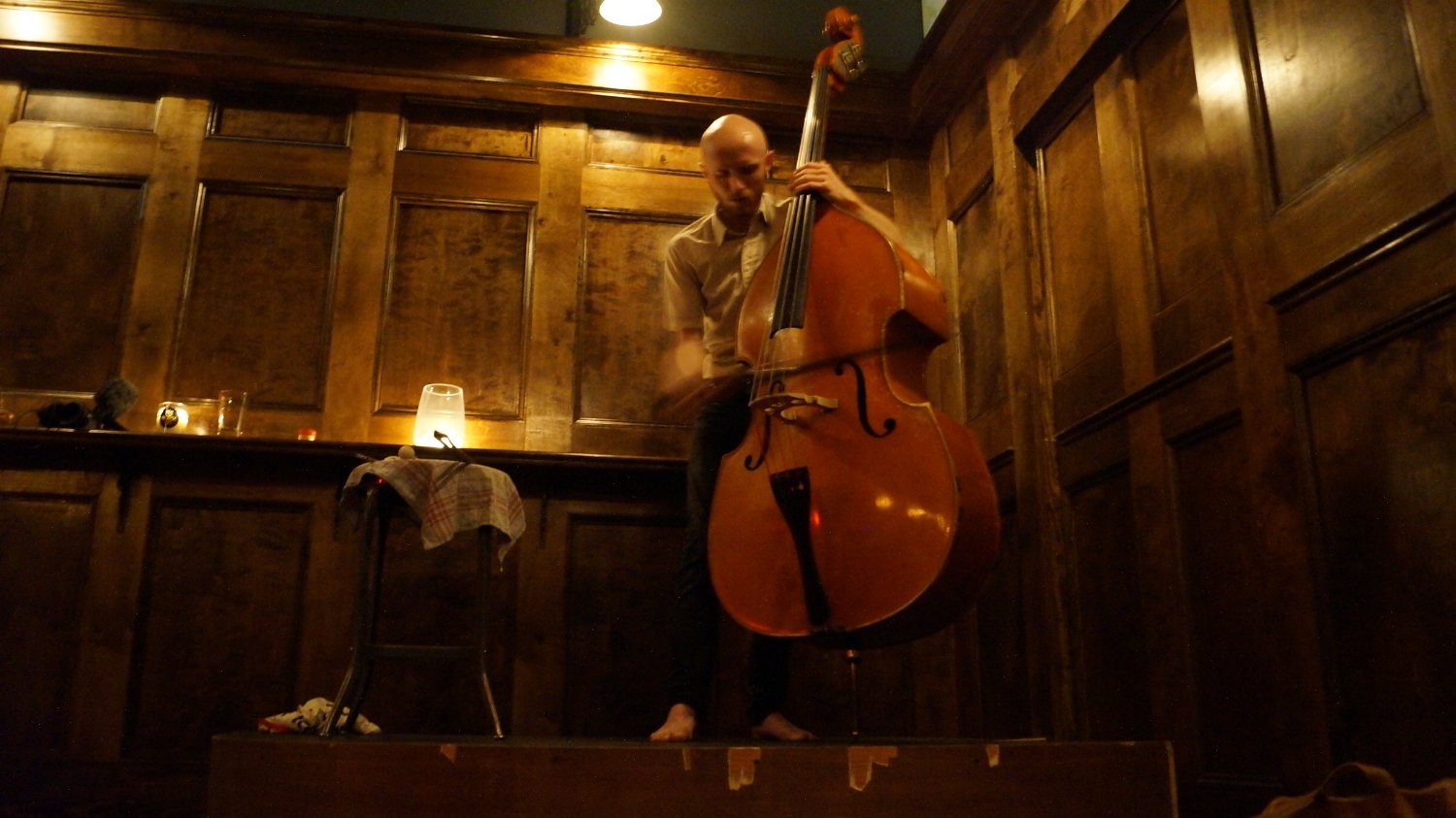 A double bass performance in Black Iris’s intimate creative space